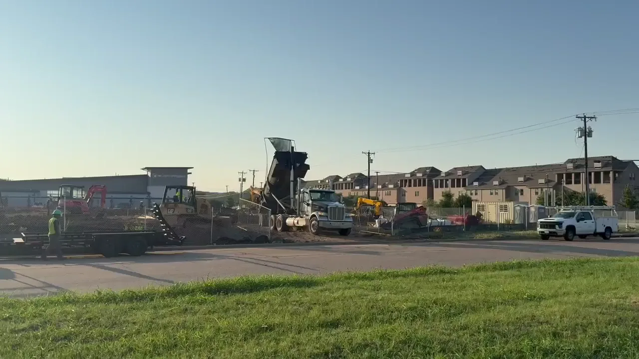 Trucks delivering emergency import fill on a Carrollton site within 24 hours of the call